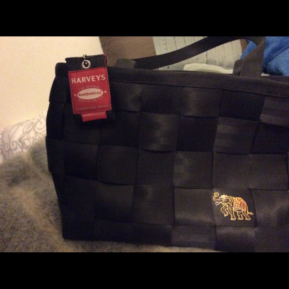 COPY - Harvey’s seatbelt purse